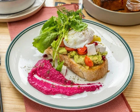 Smashed avocado on sourdough with feta and dukkah at Zee's Cafe