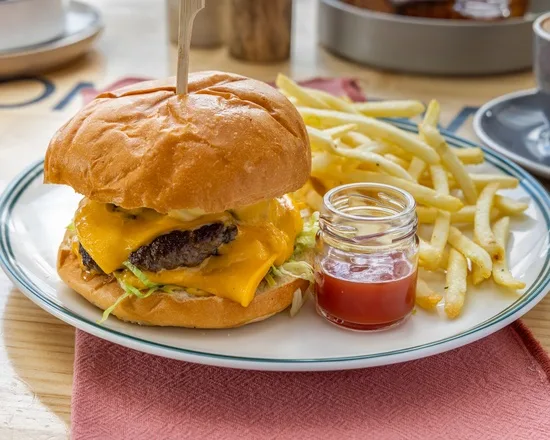 Wagyu double cheese burger with house pickles at Zee's Cafe